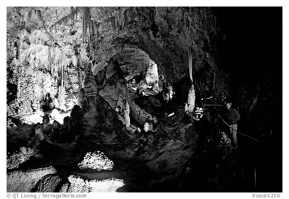 Visitor in large room. Carlsbad Caverns National Park (black and white)