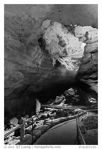 Walkway inside cave and natural entrance. Carlsbad Caverns National Park (black and white)