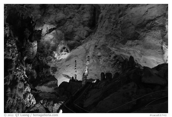 Park visitor looking,  room above Whales Mouth. Carlsbad Caverns National Park (black and white)