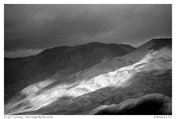 Storm light on foothills. Death Valley National Park (black and white)
