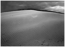 Dunes under rare stormy sky. Death Valley National Park ( black and white)
