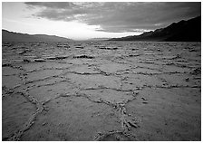Hexagonal salt tiles near Badwater, sunrise. Death Valley National Park, California, USA. (black and white)