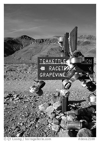 Teakettle Junction sign, adorned with teakettles. Death Valley National Park, California, USA.