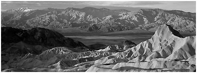 Zabriskie Point, Death Valley, and mountains in winter. Death Valley National Park (Panoramic black and white)