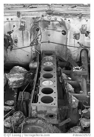 Engine of rusted car near Aguereberry camp. Death Valley National Park (black and white)
