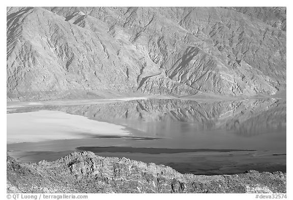 Rare seasonal lake on Death Valley floor and Black range, seen from above, late afternoon. Death Valley National Park (black and white)