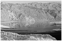 Flooded Death Valley floor at Badwater, seen from Aguereberry point, late afternoon. Death Valley National Park, California, USA. (black and white)
