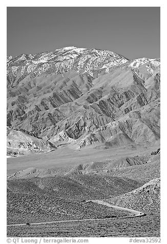 Road below Mountains above Emigrant Pass. Death Valley National Park, California, USA.