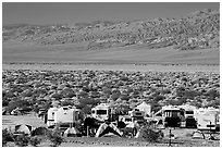 Campground and RVs at Furnace creek. Death Valley National Park, California, USA. (black and white)