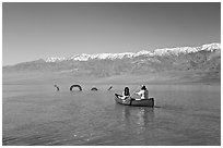 Canoe near the dragon in Manly Lake, below the Panamint Range. Death Valley National Park ( black and white)