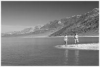 Couple on the shores of Manly Lake. Death Valley National Park ( black and white)