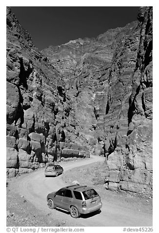 Cars in narrows, Titus Canyon. Death Valley National Park (black and white)
