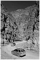 Cars in narrows, Titus Canyon. Death Valley National Park ( black and white)