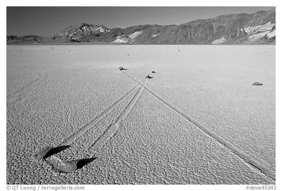 Sailing stones, the Racetrack playa. Death Valley National Park (black and white)