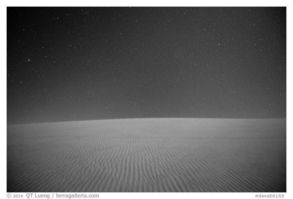 Dune ripples and starry sky. Death Valley National Park (black and white)