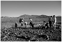 Backpackers on the Valley Floor. Death Valley National Park ( black and white)
