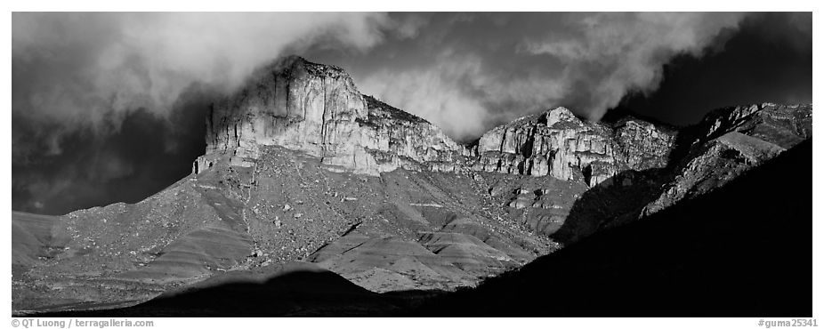 Cliffs and clouds illuminated by low sun. Guadalupe Mountains National Park (black and white)