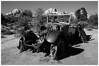 Rusting automobile near Wall Street Mill. Joshua Tree National Park ( black and white)
