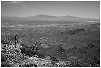 Visitor looking, Wasson Peak overlooking Tucson. Saguaro National Park ( black and white)