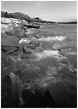 Pink granite slabs on the coast near Otter Point, morning. Acadia National Park, Maine, USA. (black and white)