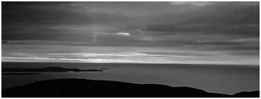 Red clouds over ocean at sunrise. Acadia National Park (Panoramic black and white)