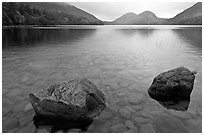 Two boulders in Jordan Pond on foggy morning. Acadia National Park, Maine, USA. (black and white)