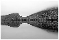 Hills, reflections, and fog in autumn, Jordan Pond. Acadia National Park, Maine, USA. (black and white)
