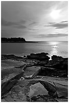 Rock slabs and sun over ocean, Schoodic Peninsula. Acadia National Park ( black and white)