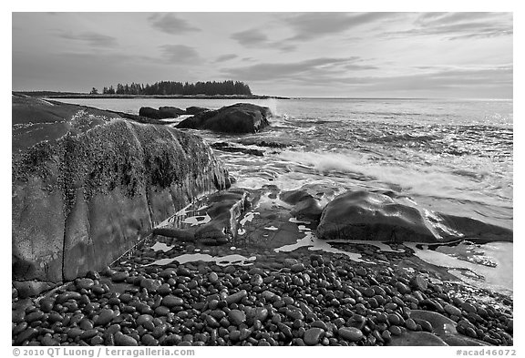 Seascape with pebbles, waves, and island, Schoodic Peninsula. Acadia National Park, Maine, USA.