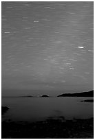 Night sky with star trails, Schoodic Peninsula. Acadia National Park, Maine, USA. (black and white)