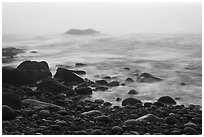 Boulders and ocean, foggy sunrise. Acadia National Park, Maine, USA. (black and white)