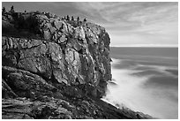 Sea cliff and blurred ocean water. Acadia National Park, Maine, USA. (black and white)