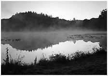 Mist raising from Kendall Lake at sunrise. Cuyahoga Valley National Park ( black and white)