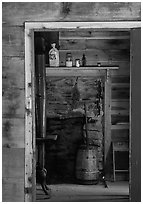 Room seen through doorway inside cabin, Cades Cove, Tennessee. Great Smoky Mountains National Park, USA. (black and white)