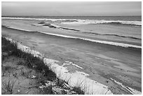 Beach in winter with snow and ice. Indiana Dunes National Park ( black and white)
