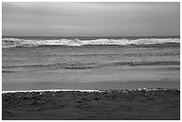 Beach in winter with ice. Indiana Dunes National Park ( black and white)
