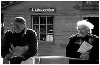 Commercial fishermen Milford and Monica Johnson at Sivertson Fish House. Isle Royale National Park ( black and white)