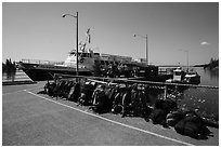 Backpacks lined up on dock, Rock Harbor. Isle Royale National Park ( black and white)