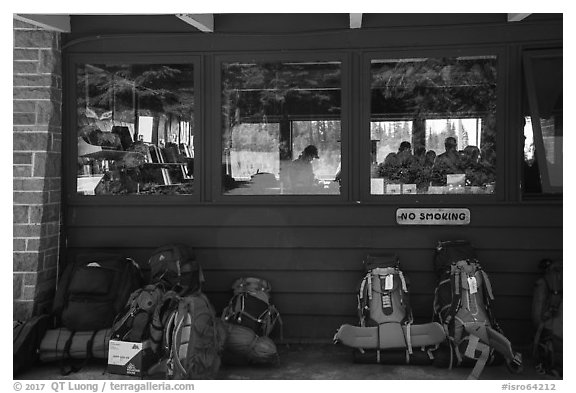 Backpacks lined behind visitor center, Rock Harbor. Isle Royale National Park (black and white)