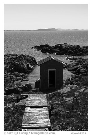 Shack and Isle Royale in the distance, Passage Island. Isle Royale National Park (black and white)