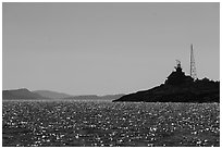 Lighthouse on Passage Island with Isle Royale in the distance. Isle Royale National Park ( black and white)
