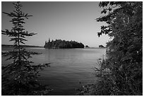 Islands of archipelago framed by trees from Tookers Island. Isle Royale National Park ( black and white)