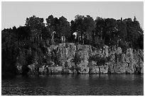 Sea cliffs and trees, late afternoon. Isle Royale National Park ( black and white)