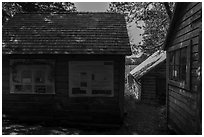 Bangsund Cabin with technical posters and norvegian flag. Isle Royale National Park ( black and white)