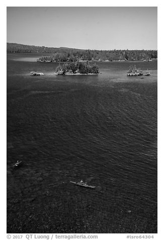 Kayakers, blue waters, and islets from above. Isle Royale National Park (black and white)