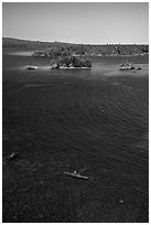 Kayakers, blue waters, and islets from above. Isle Royale National Park ( black and white)