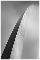 Curve of Gateway Arch on foggy night. Gateway Arch National Park ( black and white)