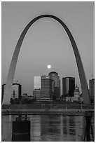 Moonset framed by Arch across Mississippi River. Gateway Arch National Park ( black and white)