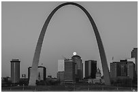 Moonset, downtown buildings, Old Courthouse, framed by Arch. Gateway Arch National Park ( black and white)