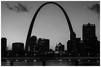 Arch and Old Courthouse across Mississippi River at sunset. Gateway Arch National Park ( black and white)